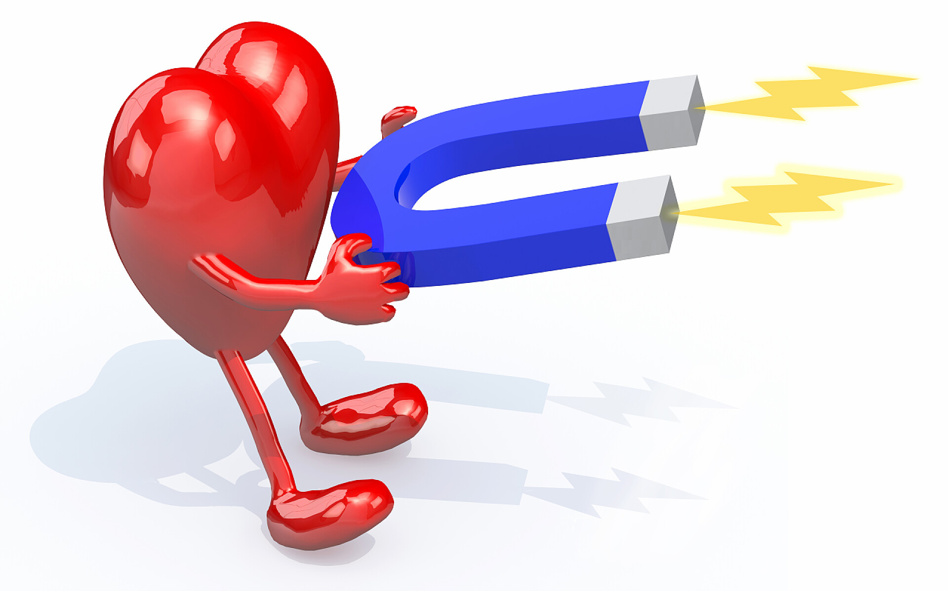 医疗健康心脏模型举起一块磁铁爱的吸引力概念