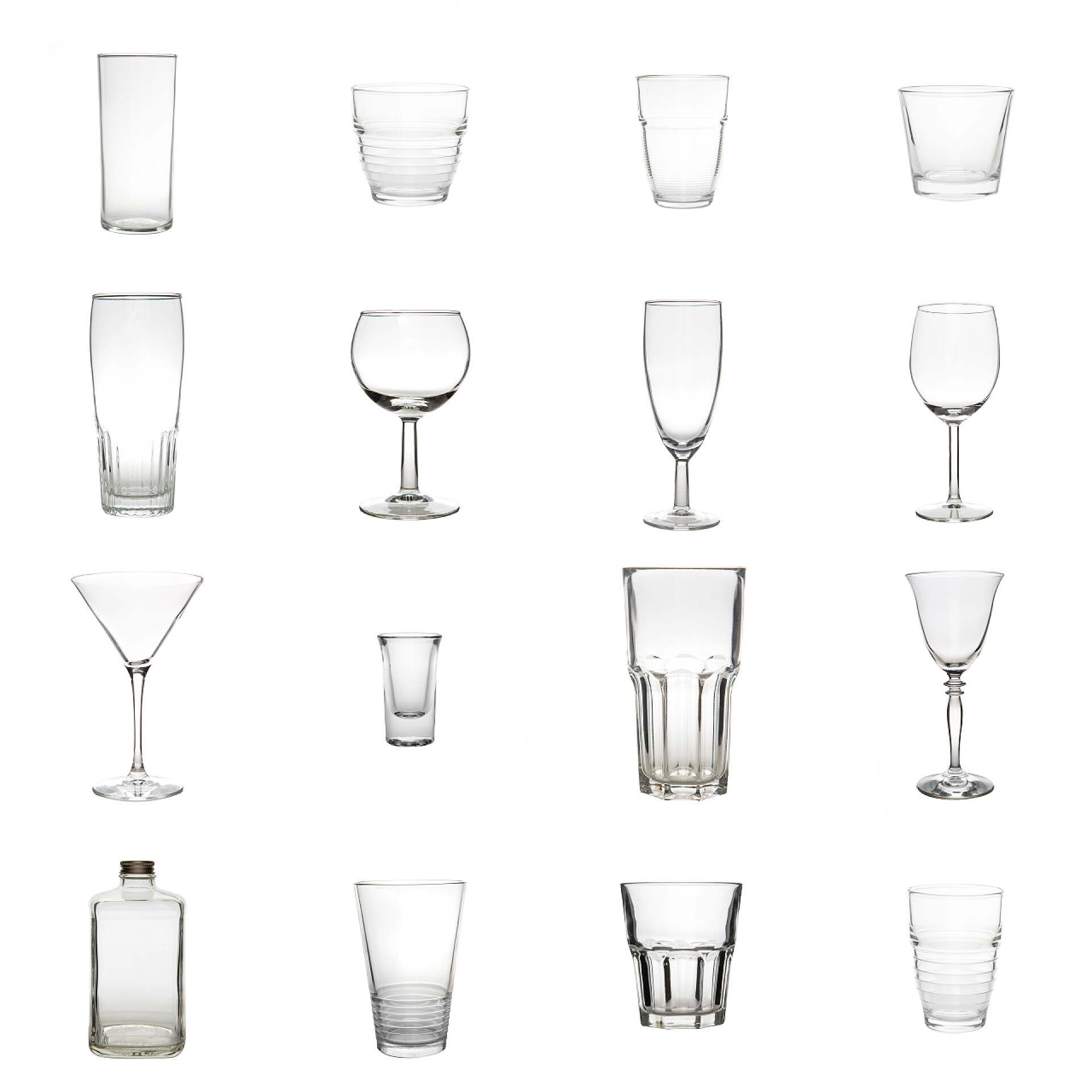 白色背景上各种形状的玻璃杯餐具