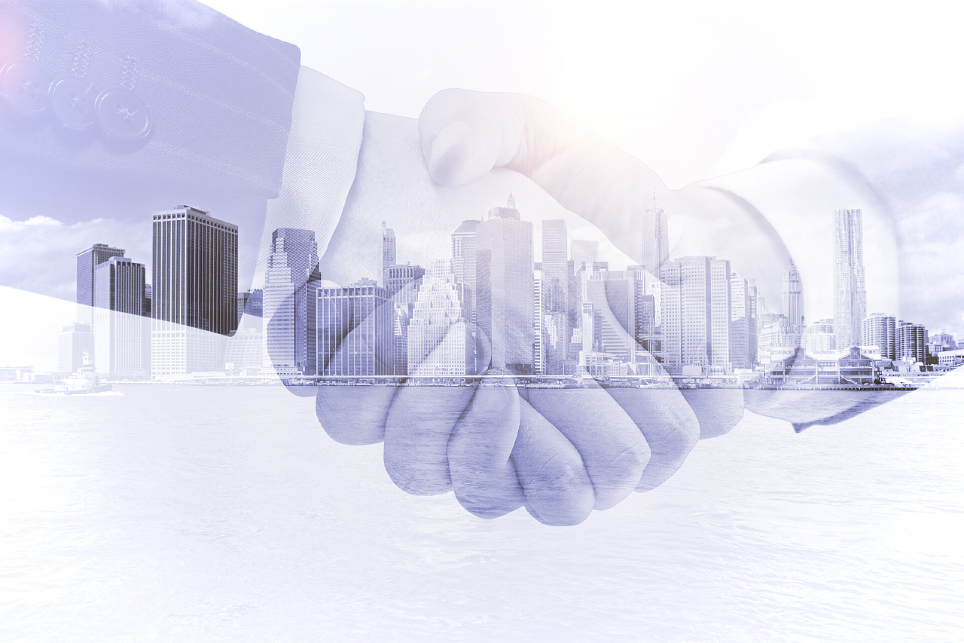 商务城市背景上商人握手商务合作双重曝光