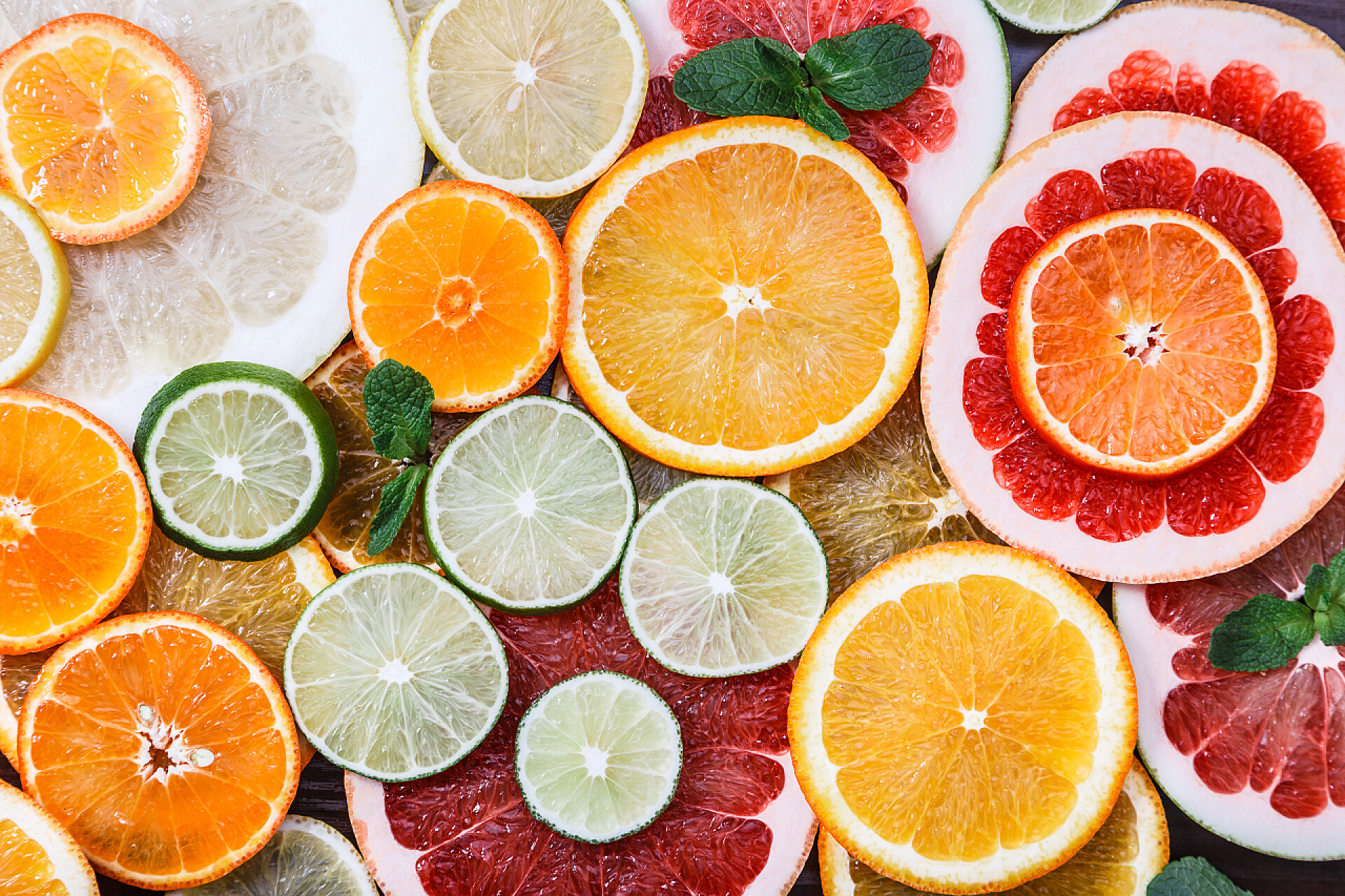 新鲜柠檬柚子水果切片背景