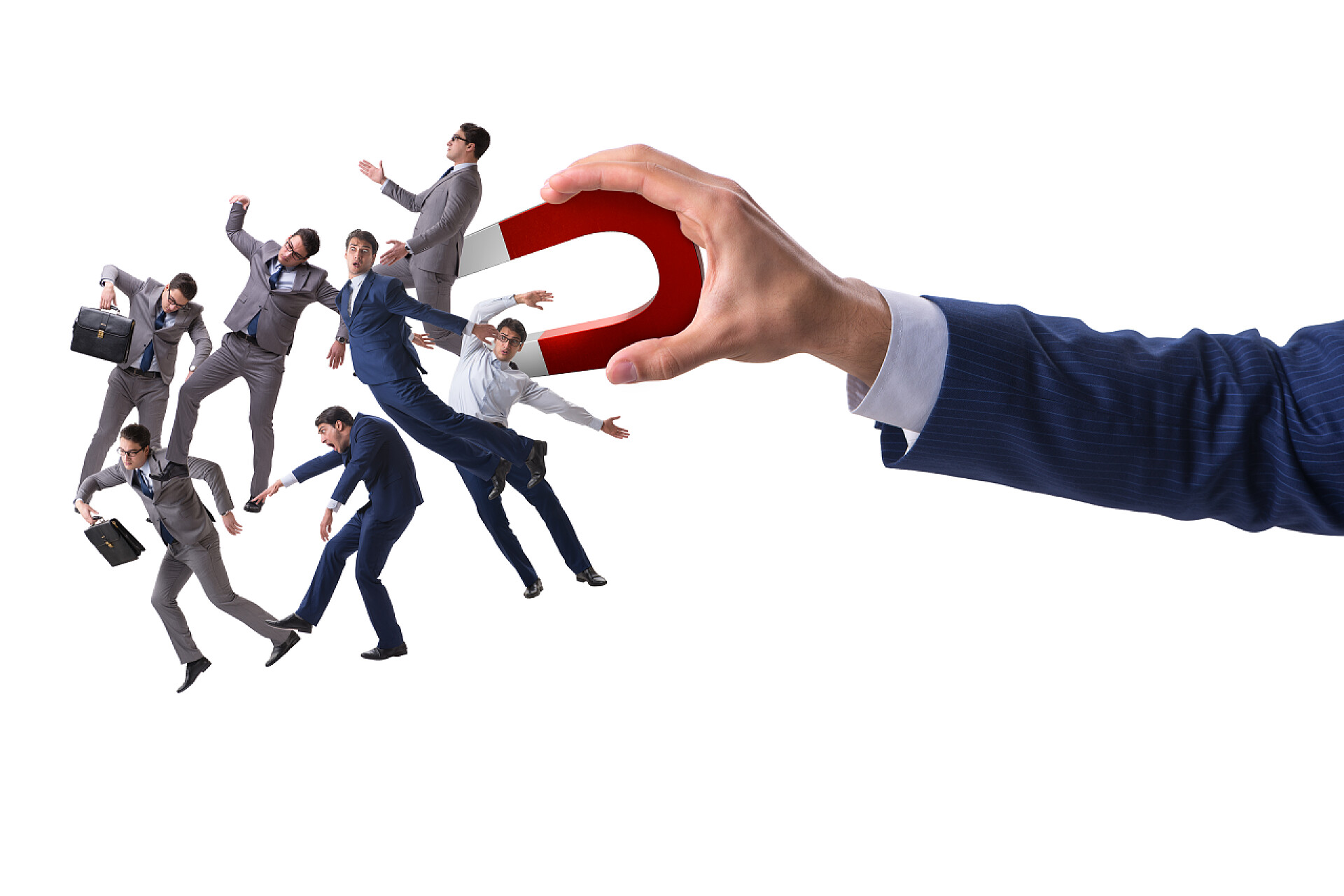 商务商人用马蹄磁铁招聘员工