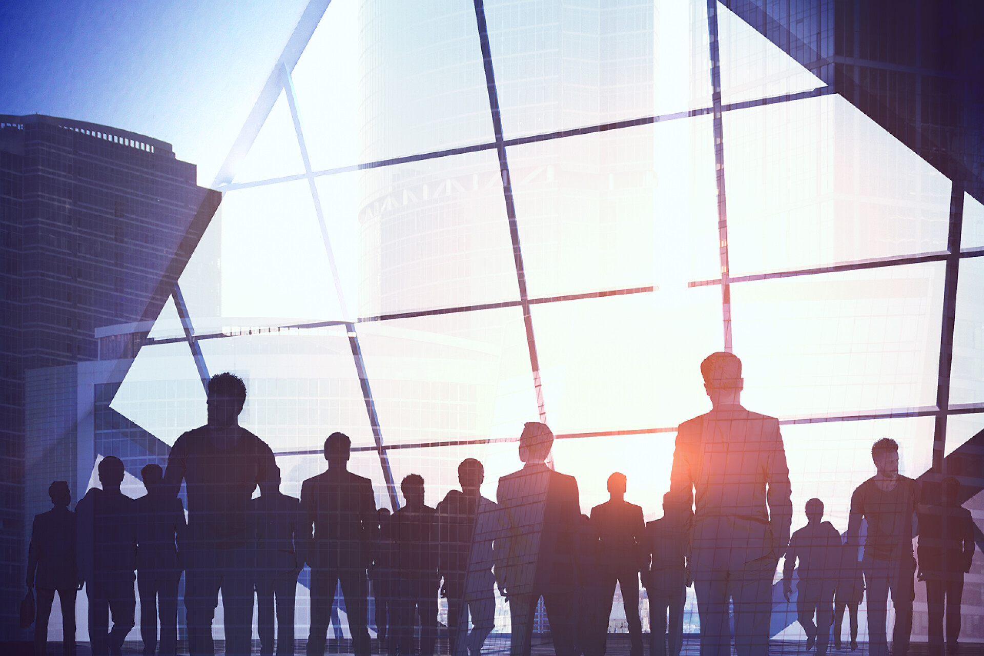 商务高楼大厦和人物剪影融合的背景