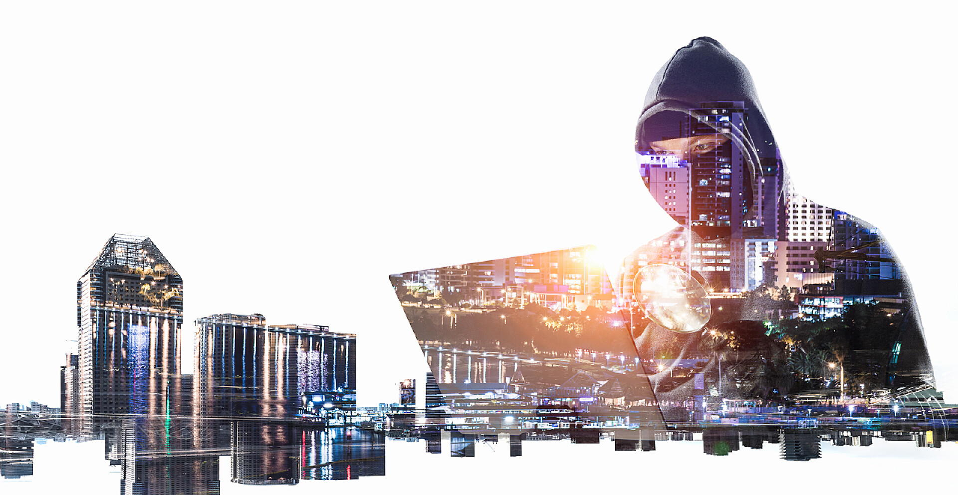 现代化城市背景中正在使用笔记本电脑的黑客