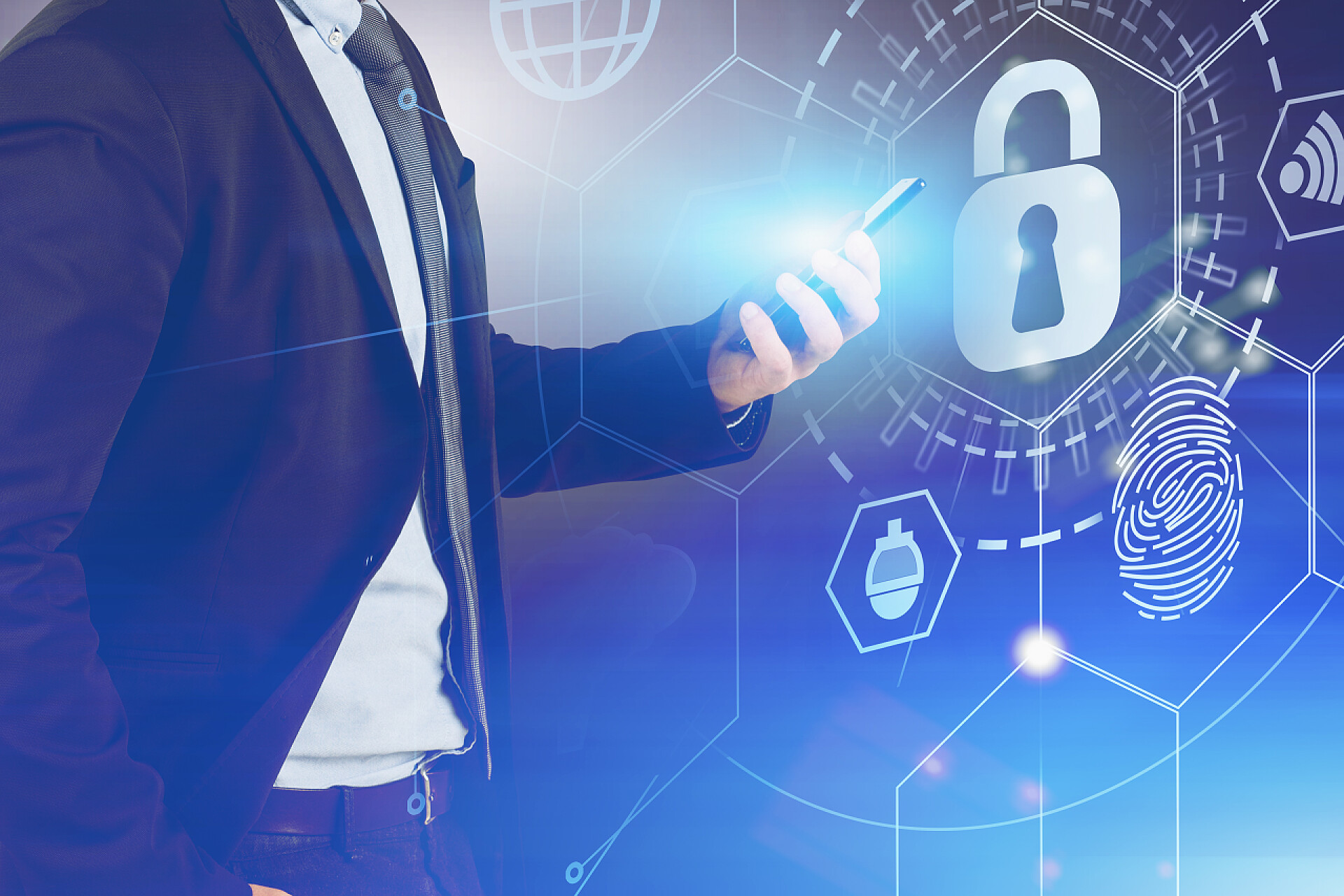 现代化科技背景中一个商务男人拿着智能手机网络通讯