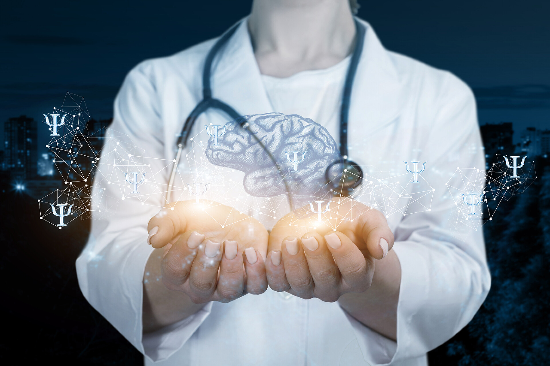 医疗健康在黑色背景下医生手捧着脑子的图像