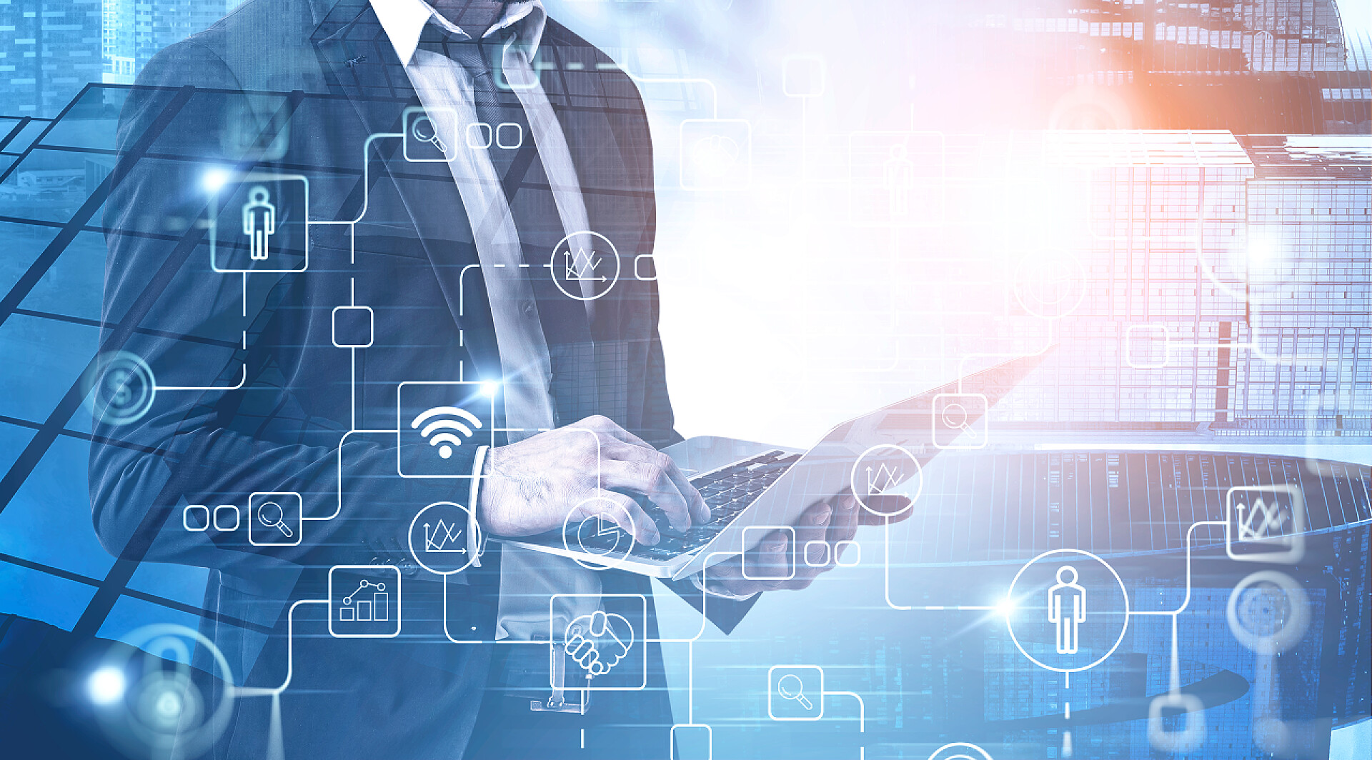 商务商人使用笔记本电脑与城市景观和数字图标的双重曝光