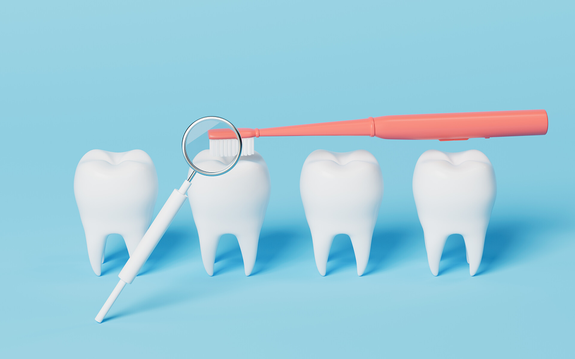 白色背景上的牙齿和牙刷牙科