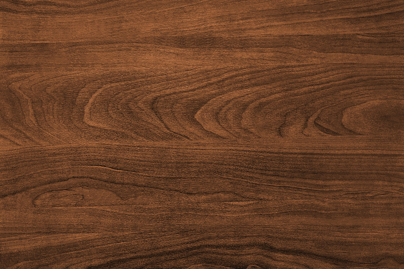 硬木篮球场上的橙色球木炭火木质背景,质地轻的木质盾牌或木板面板