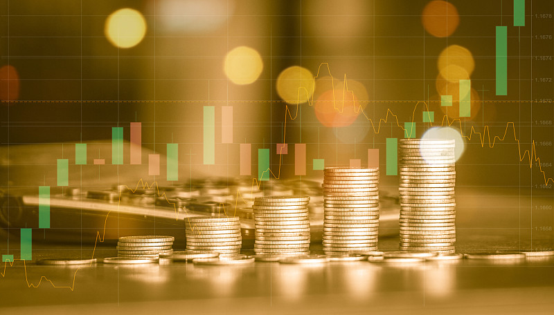 金币与交易图形的叠加，可以作为金融投资概念的背景