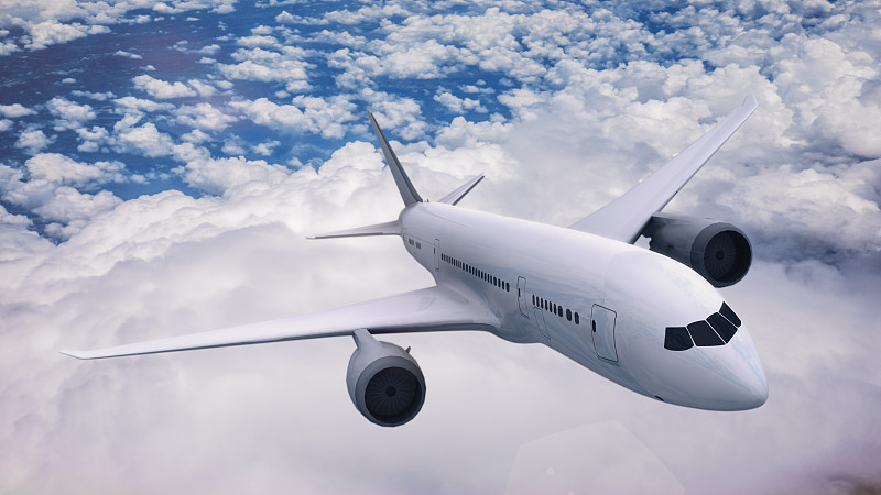 商业飞机在云层上飞行