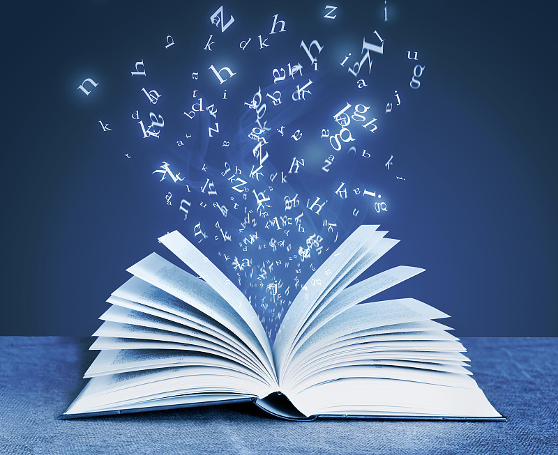 字母围绕翻开书