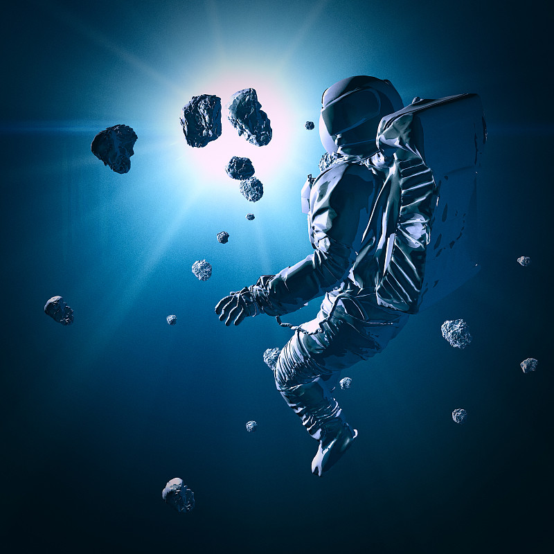 漂浮在太空中的宇航员。新的世界和未探索的星系。小行星和行星