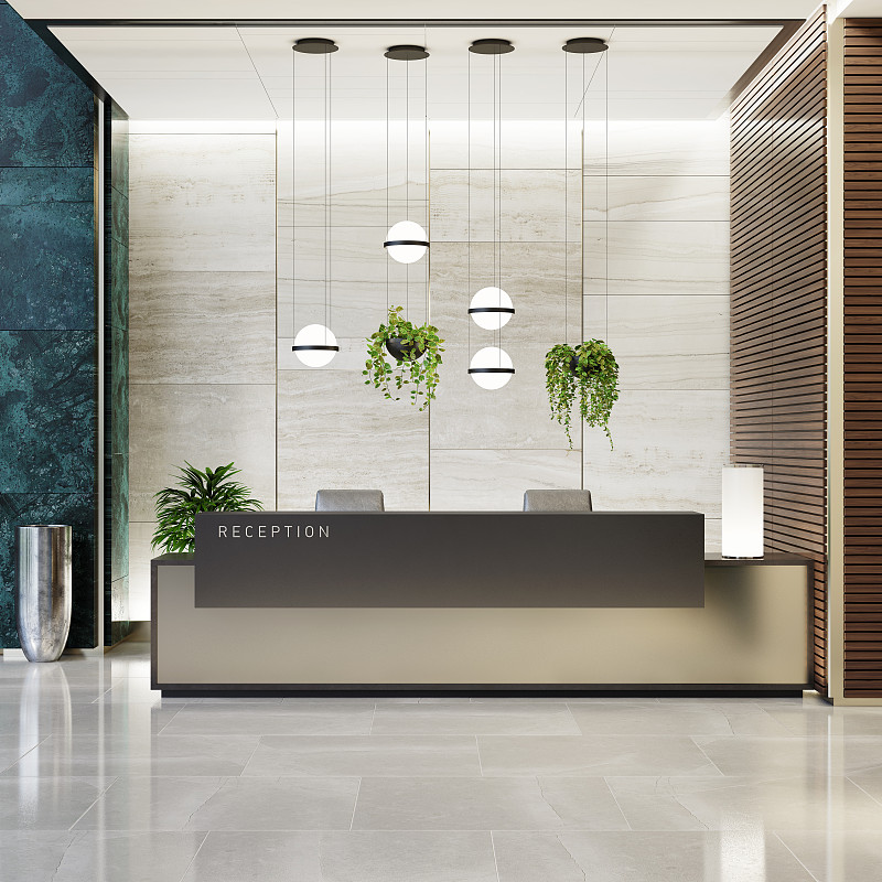 现代化的办公室大堂内部区域有电梯和楼梯和长长的接待台
