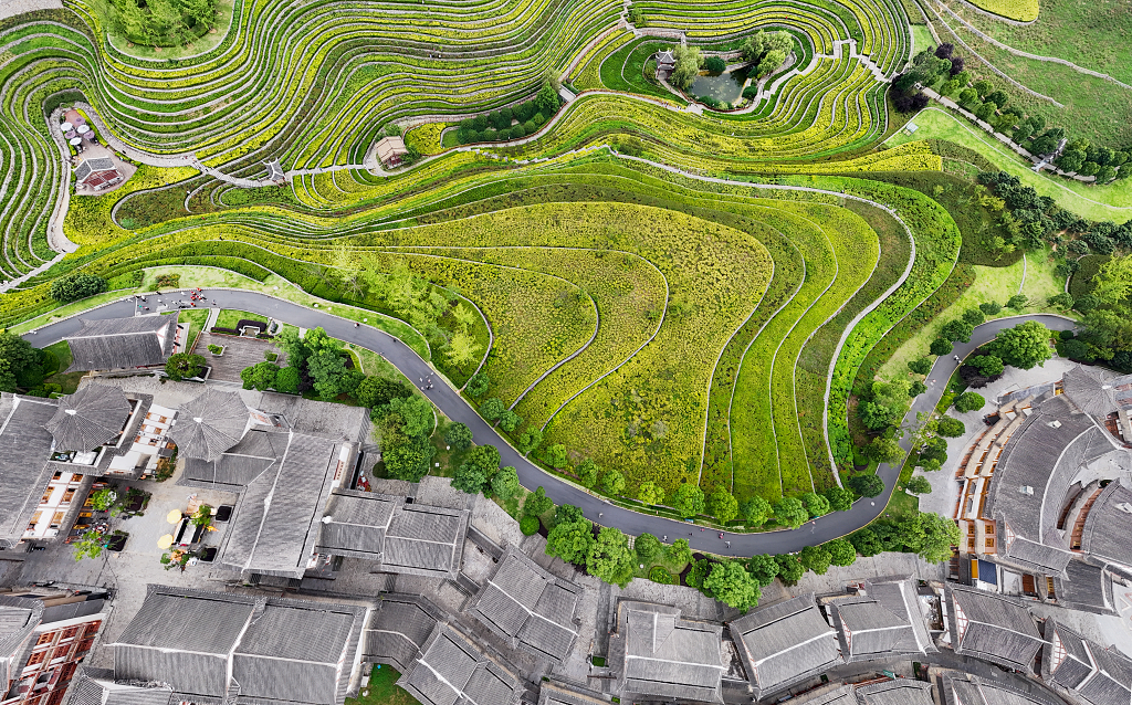 航拍贵州奢香古镇梯田和房屋及小路