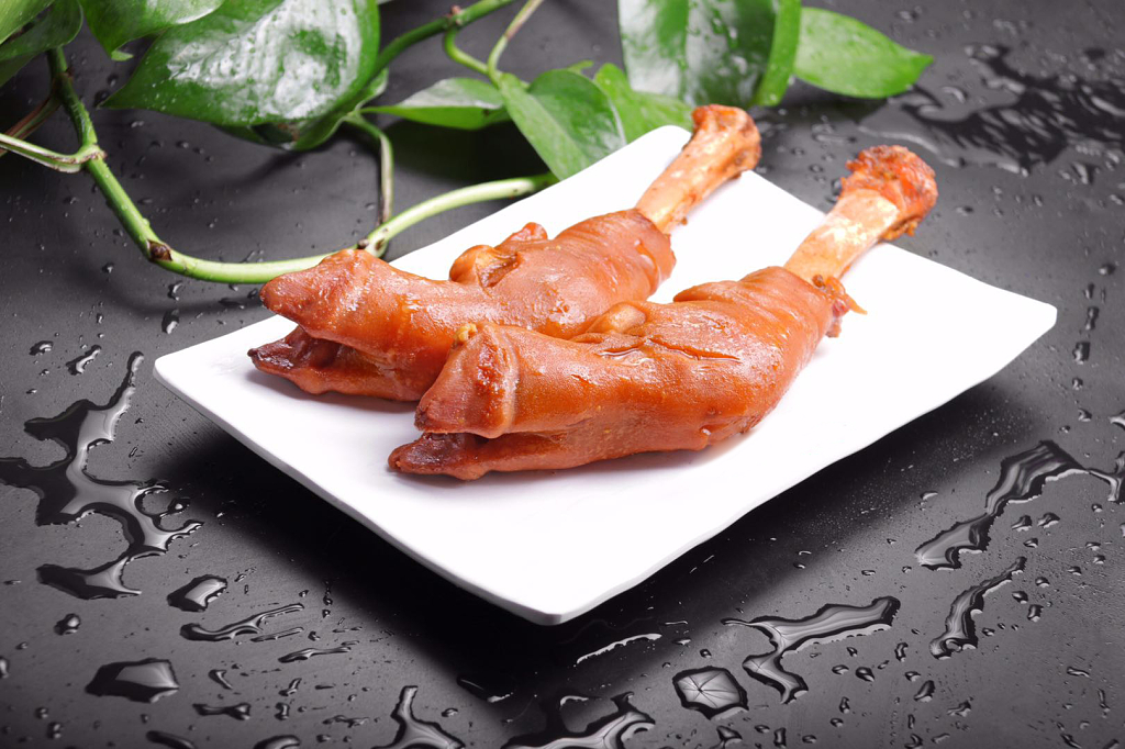 黑色简约背景卤羊蹄