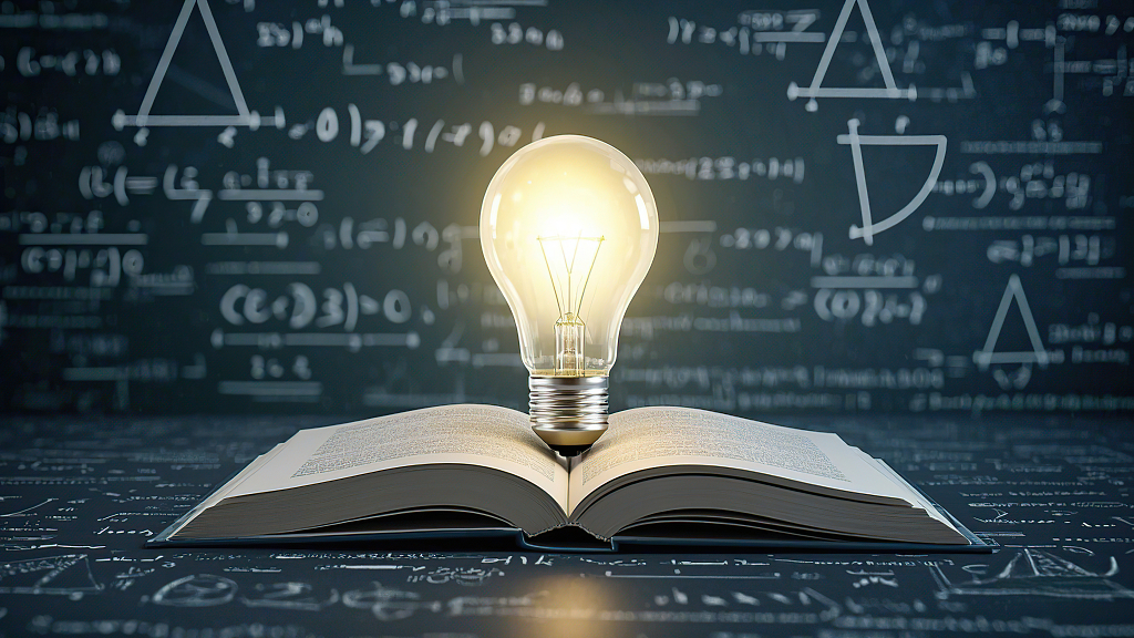 科技书本上灯泡亮数学灵感来AI