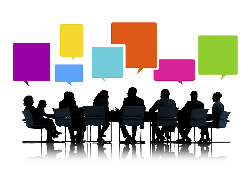 商务人士在会议上的剪影与演讲泡泡