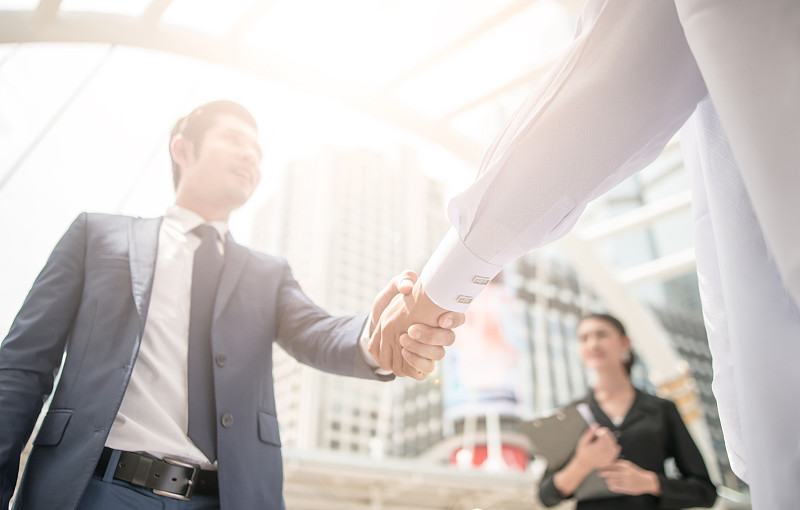 握手业务人员同事团队合作