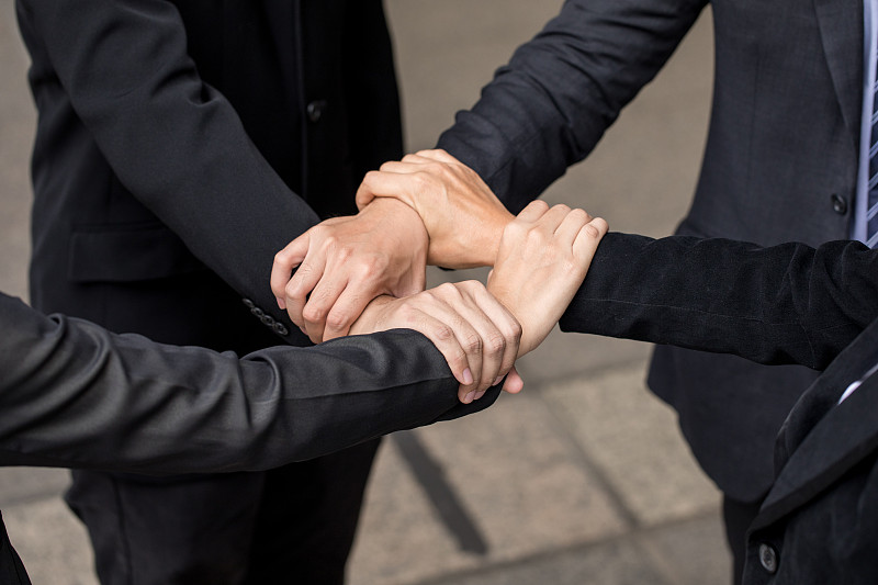 商人团队协作关系概念。业务伙伴会议概念