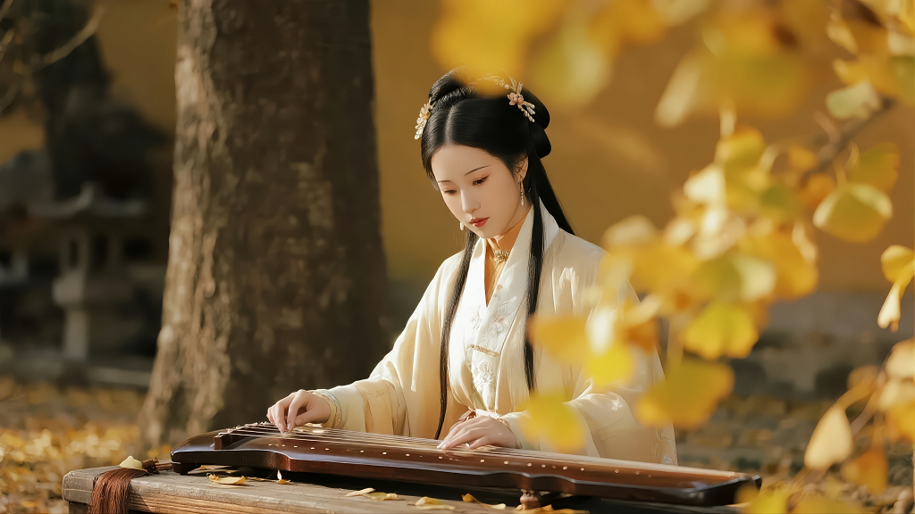 古装女子弹古筝银杏叶秋日艺术人像背景