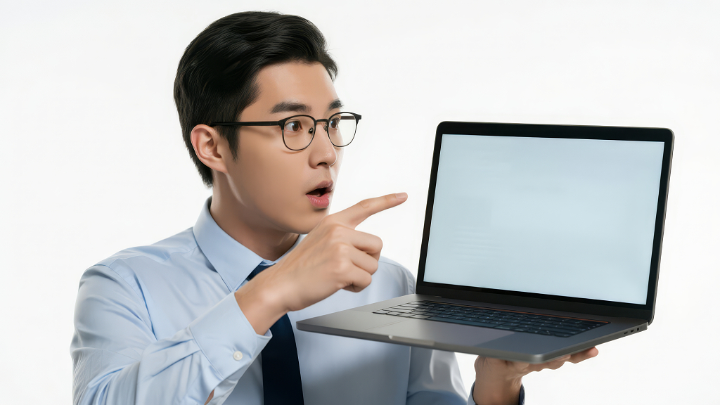 商业男士惊讶指向电脑屏幕广告素材