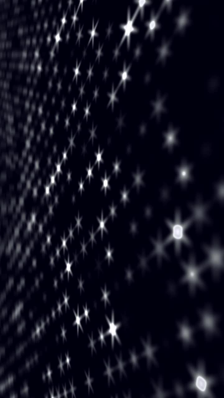 数字屏幕上的脉冲led点。迪斯科墙背景与闪烁的灯光。闪亮的led舞台，音乐会灯光，灯具。闪闪发光的亮片幕布背景音乐表演。股票视频